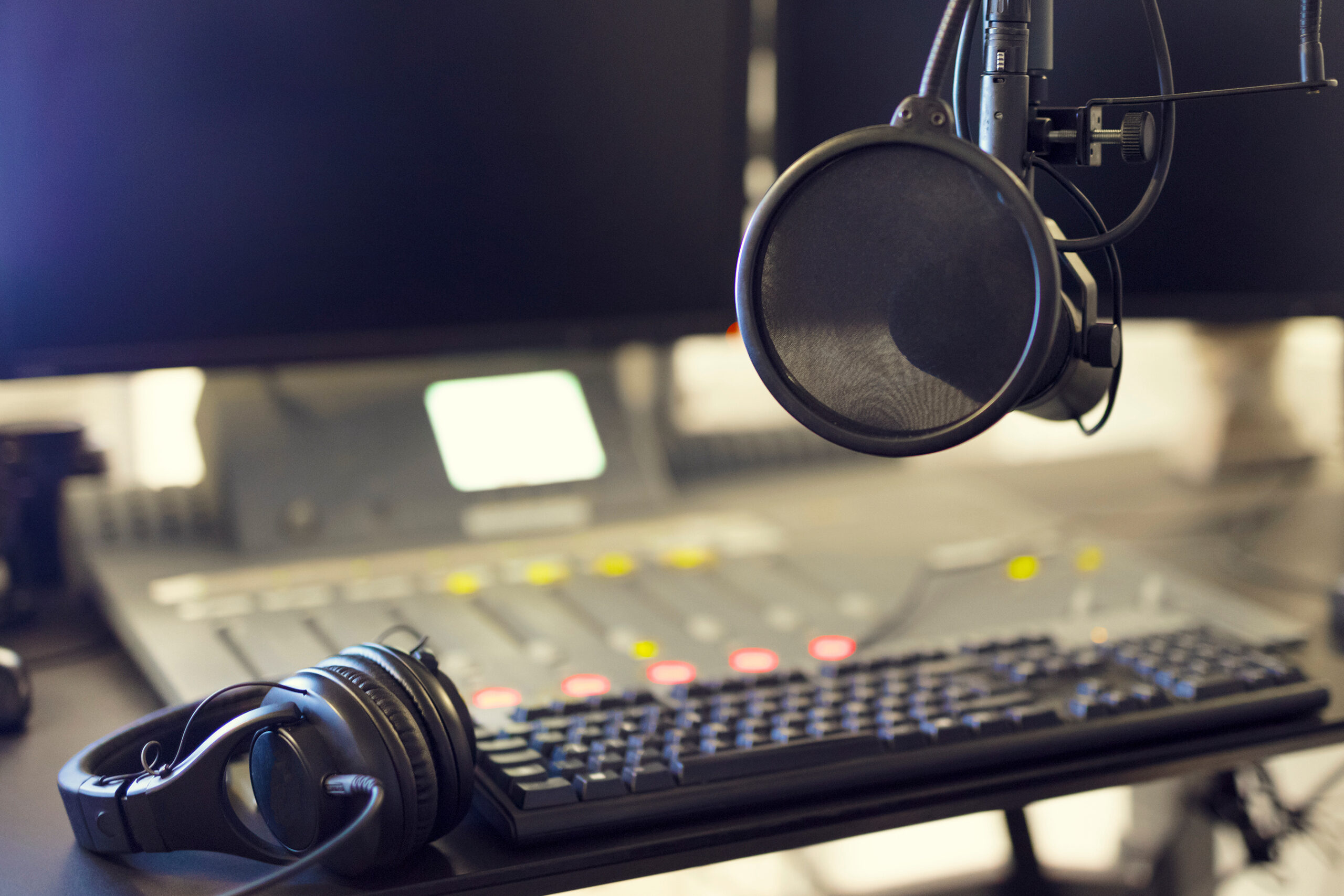 Microphone and headset in radio station broadcasting studio