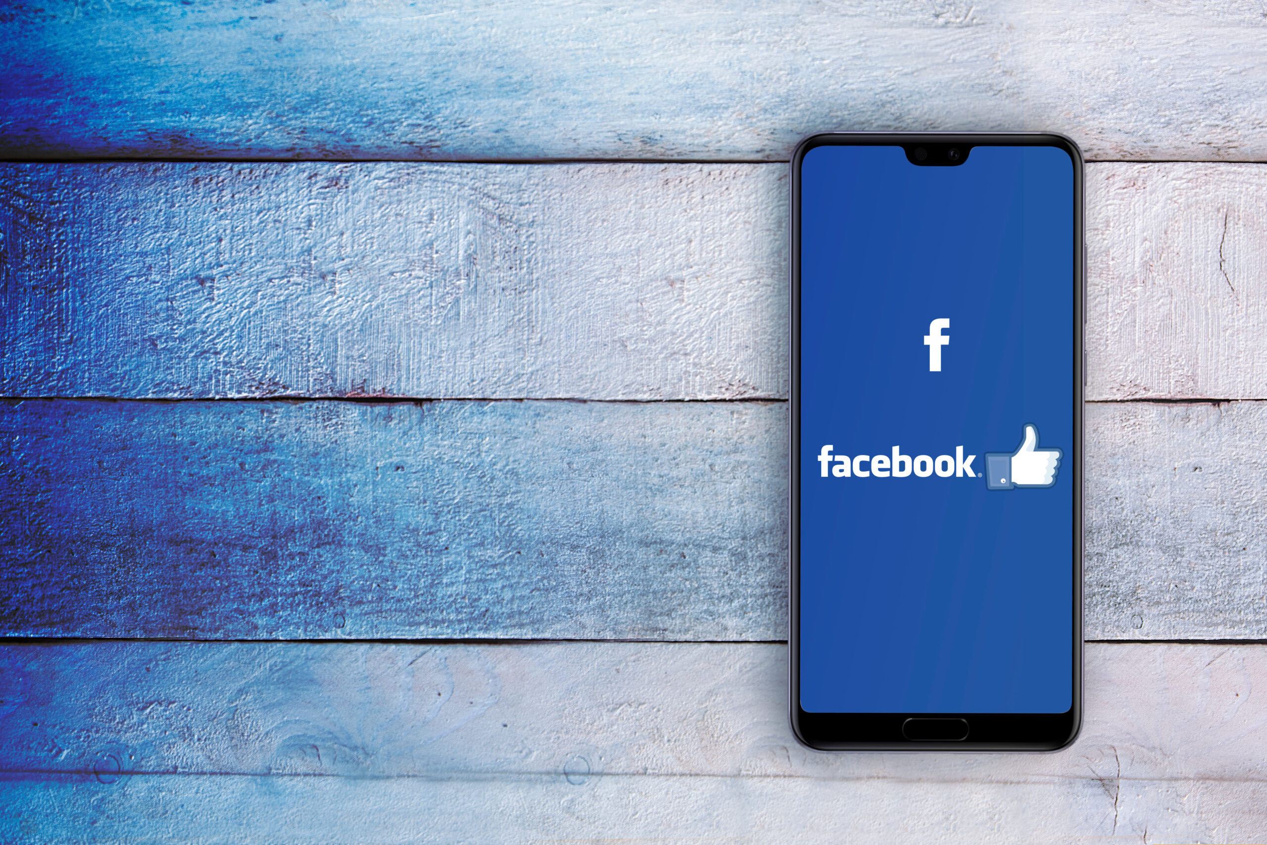 BARCELONA, JAN 31: Smartphone with Facebook social media app log